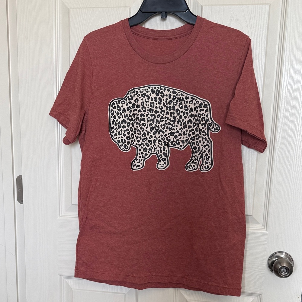 Leopard print Buffalo t shirt.  Terra cotta color.  Women’s L